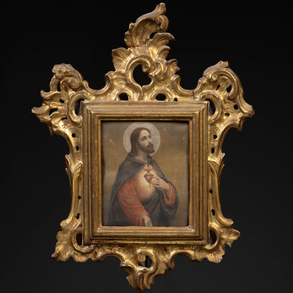 Frame in carved and gilded wood of the nineteenth century with rocaille decoration.