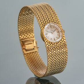 Omega, Reloj de dama en oro amarillo de 18kt.