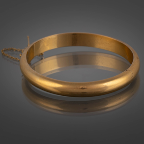 Pulsera rígida en oro amarillo de 18kt.