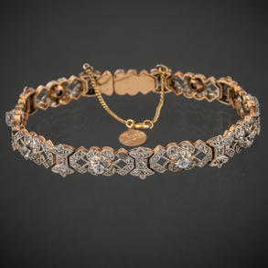 Pulsera antigua en oro amarillo de 18 kt con brillantes.