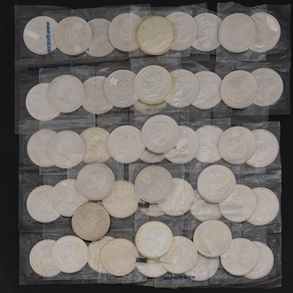 Conjunto de 54 monedas conmemorativas en plata española del siglo XX.