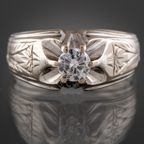 Anillo en oro blanco de 18 kt con brillante cetral de 0,25 qt. Aprox.