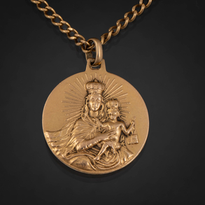 Cadena de eslabones y medalla de la Virgen con el niño en oro amarillo de 18 kt.