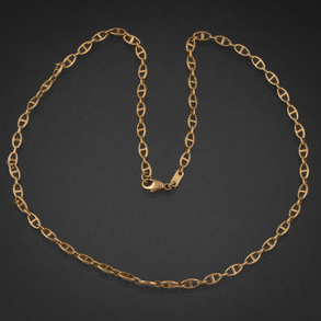 Cadena de eslabones en oro amarillo de 18 kt con cierre de mosquetón.