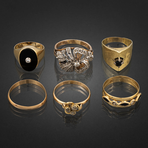 Conjunto de cinco sortijas y una alianza en oro amarillo y oro rosa  de 18 kt.