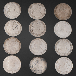 Conjunto de doce monedas de Reales de a Ocho de Carlos IV