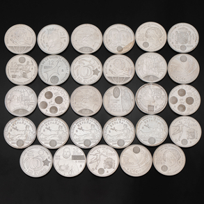 Conjunto de veintinueve monedas conmemorativas AG del Rey Juan Carlos y la Reina Sofia