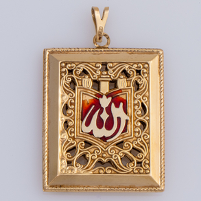 Colgante en forma de libro del corán en oro amarillo de 18 kt.