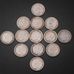 Conjunto de trece monedas de cincuenta céntimos de Alfonso XII y Alfonso XIII en plata