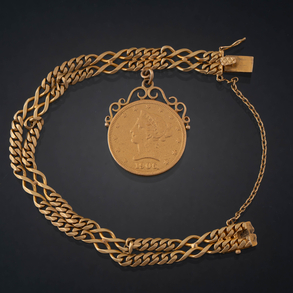Bonita pulsera de doble eslabón con colgadura de una moneda de diez dólares de los Estados Unidos de América del año 1906 en oro amarillo de 18 kt.